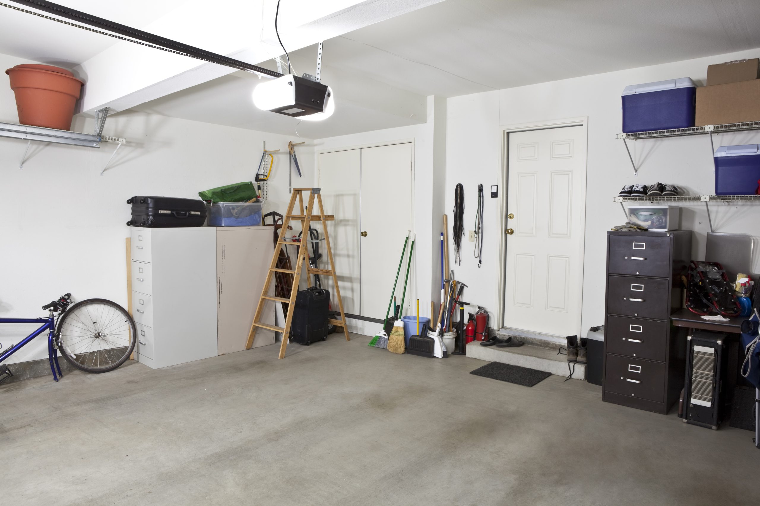 Clean swept interior of a suburban garage, exemplifying an area serviced by professional property cleanout and junk removal services.